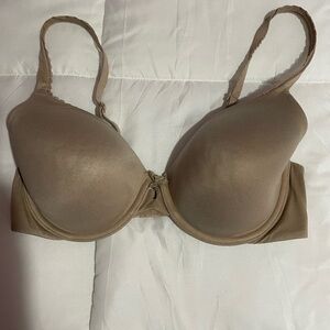 Victoria’s Secret Nude bra with silver V charm. Size 34D underwire